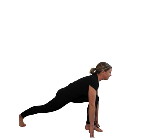 woman in black doing a runner's stretch.