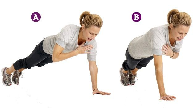 Woman doing plank shoulder taps in two steps