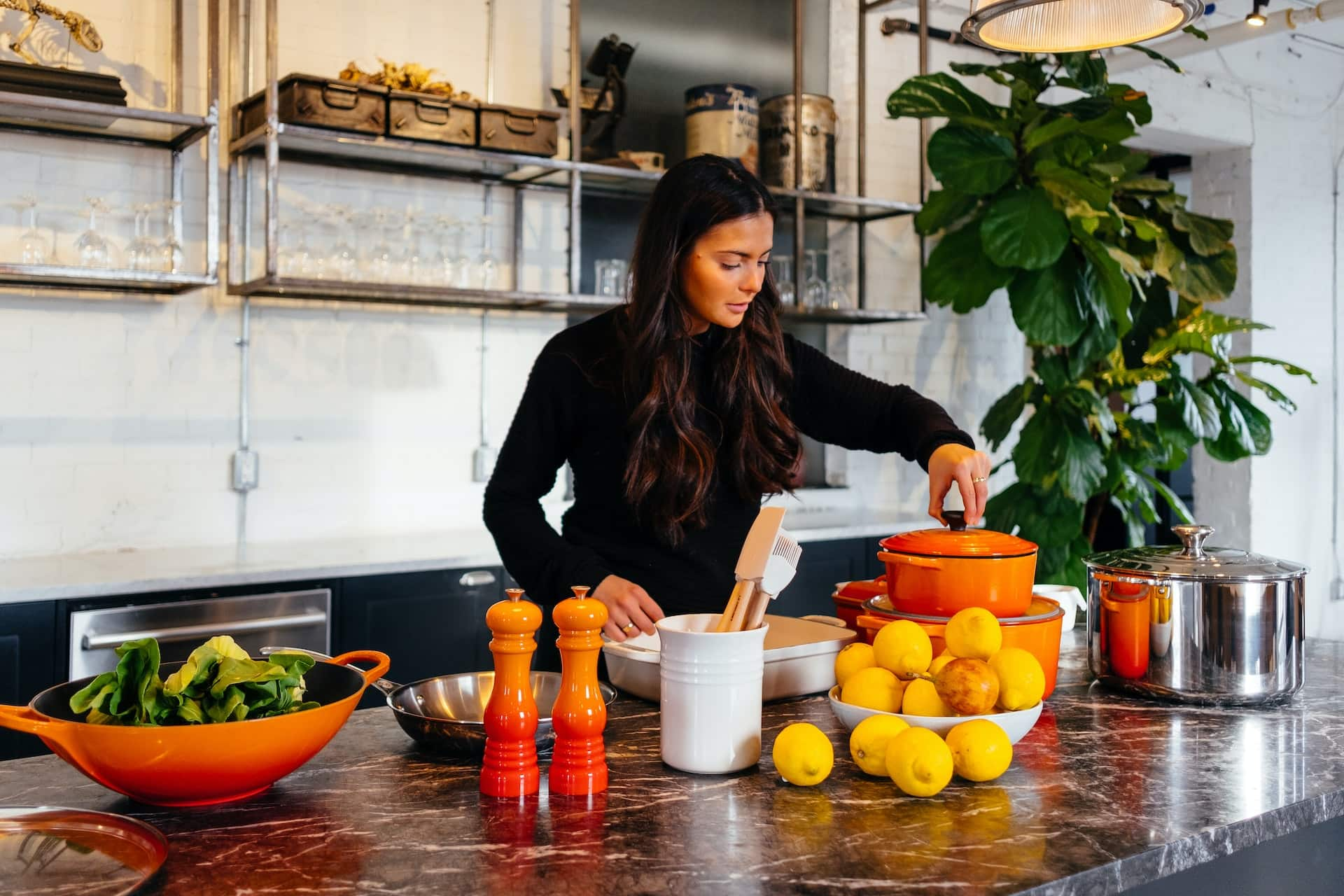 woman-cooking-in-modern-colorful-kitchen