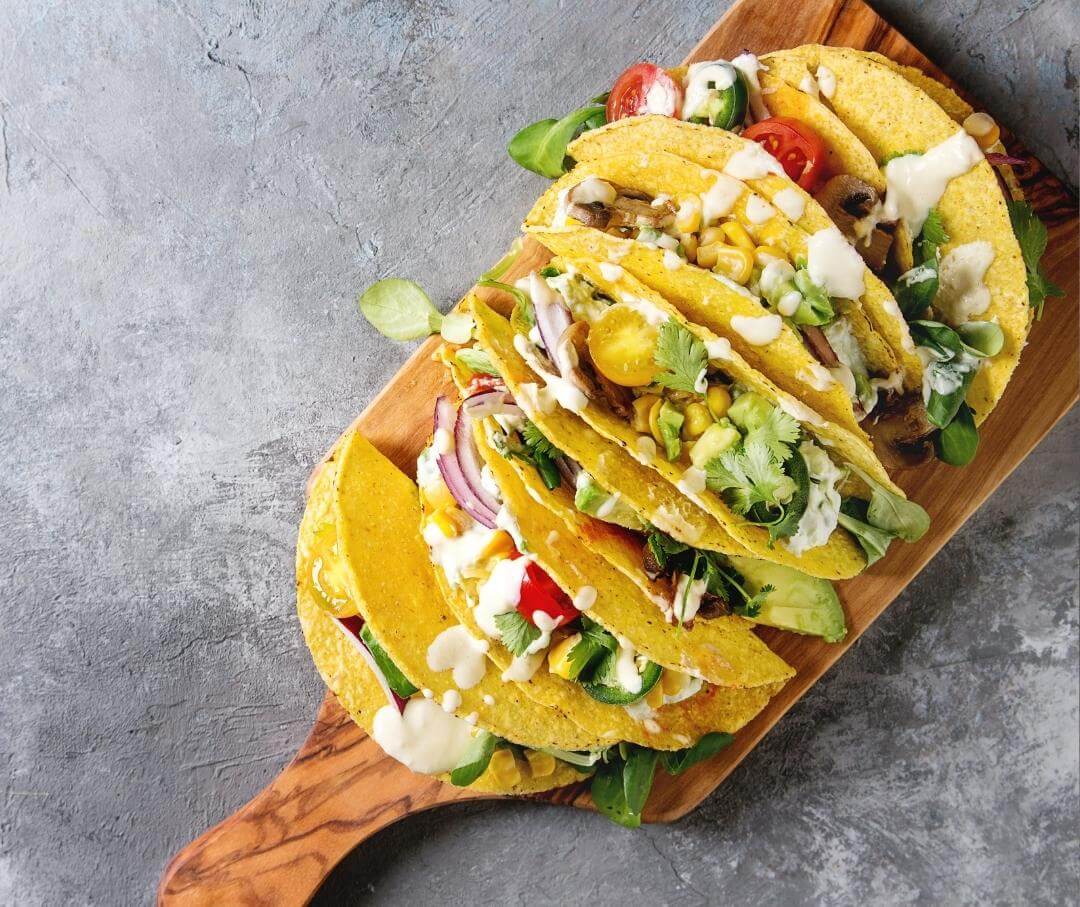 6 tacos in hard shell corn tortillas seen from above