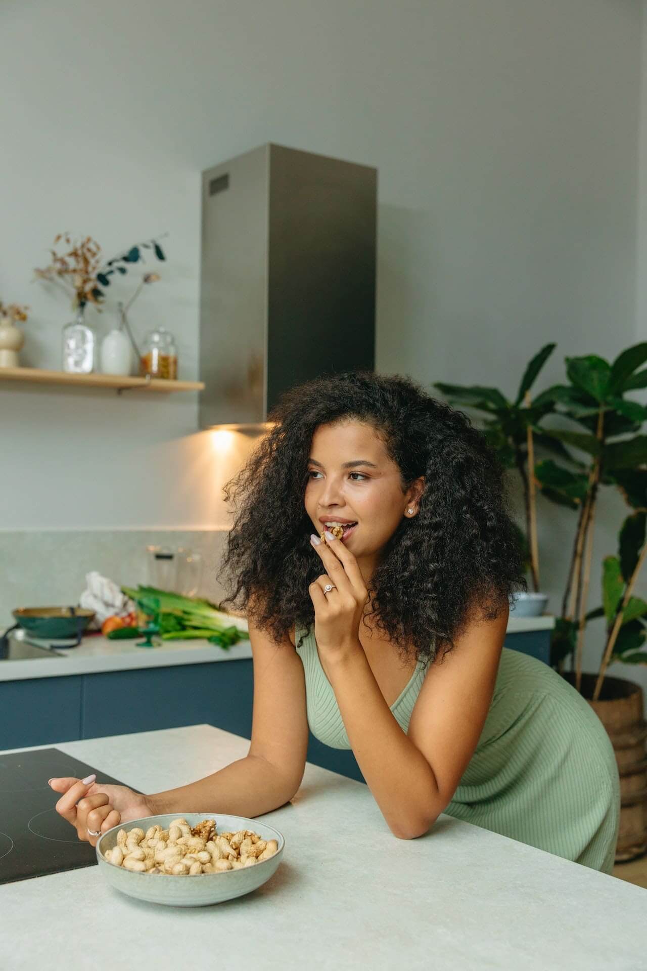 Woman-snacking-in-the-kitchen