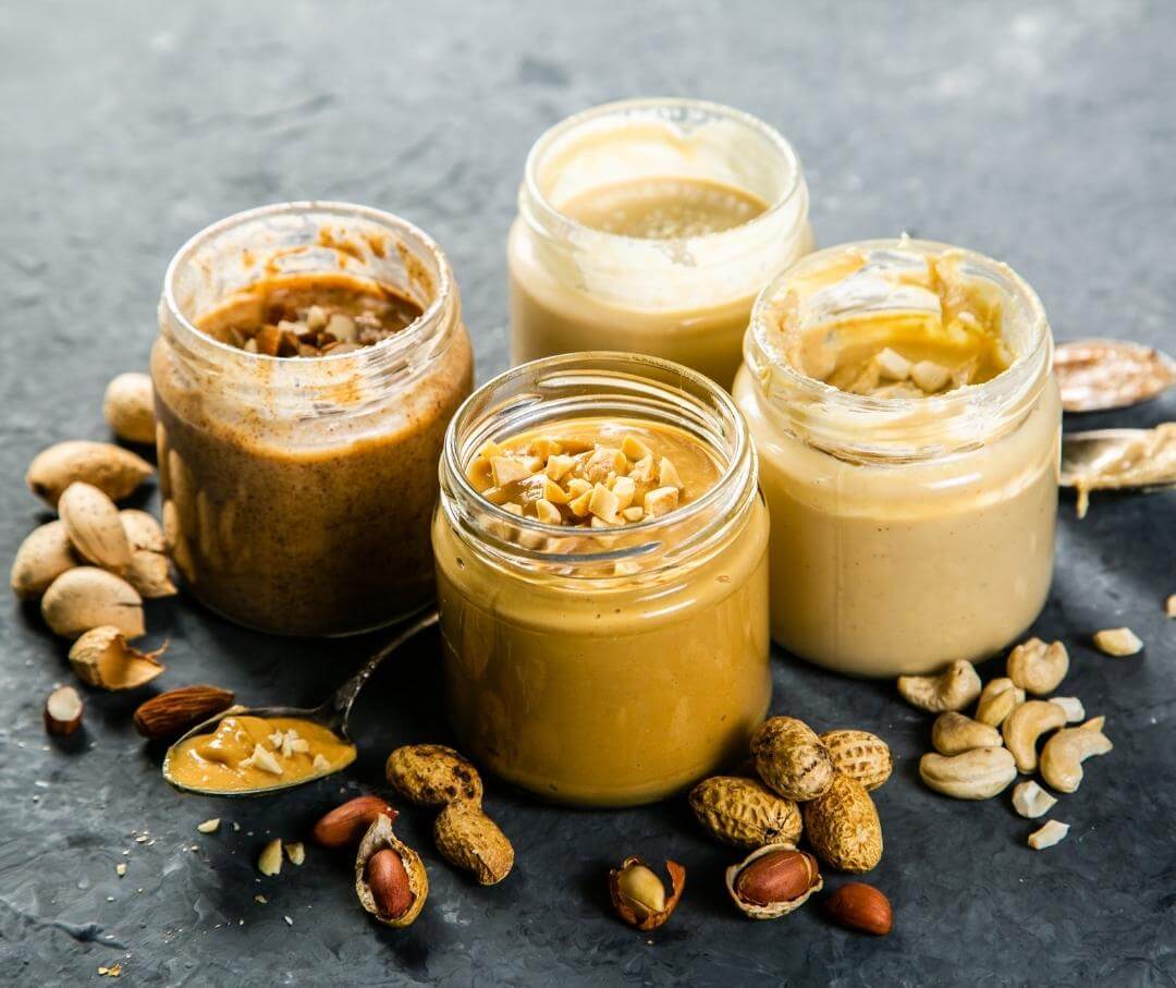 four jars of nut butter