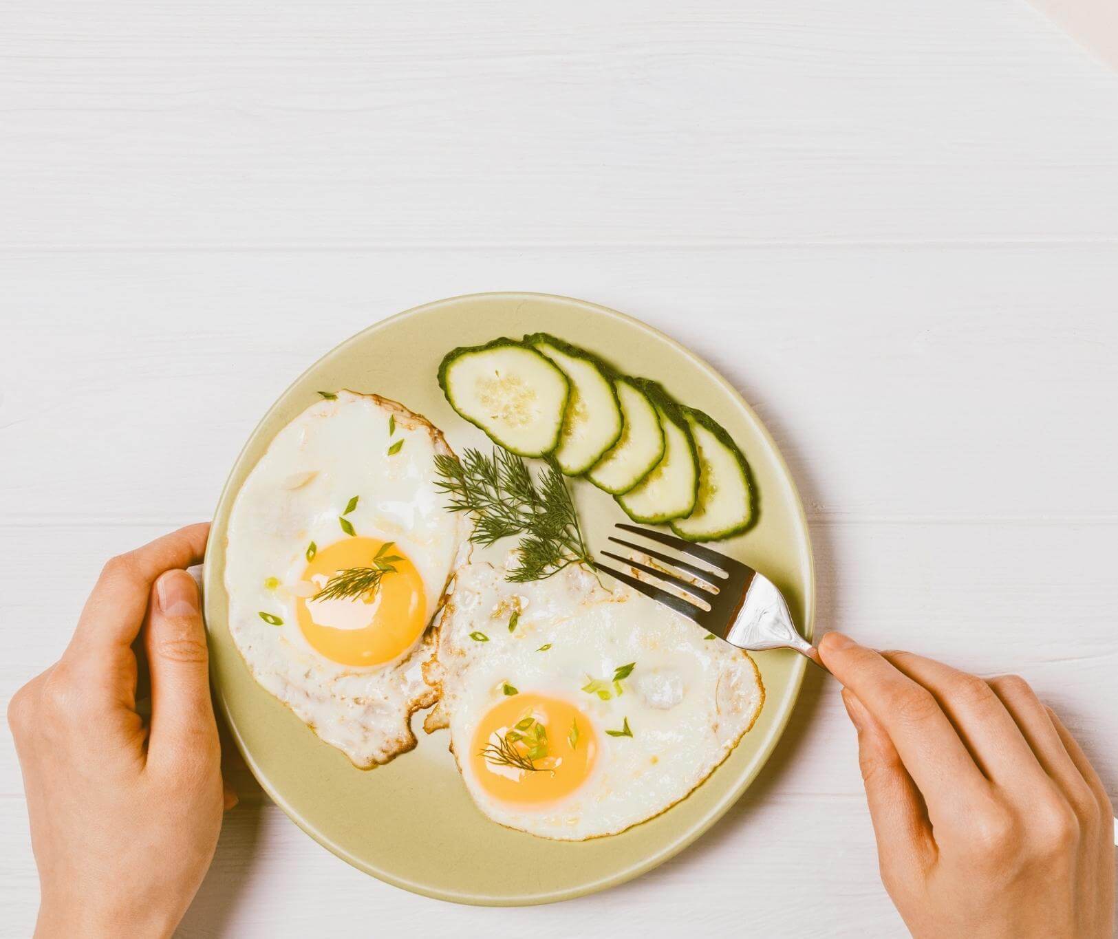 A plate of eggs and vegetables