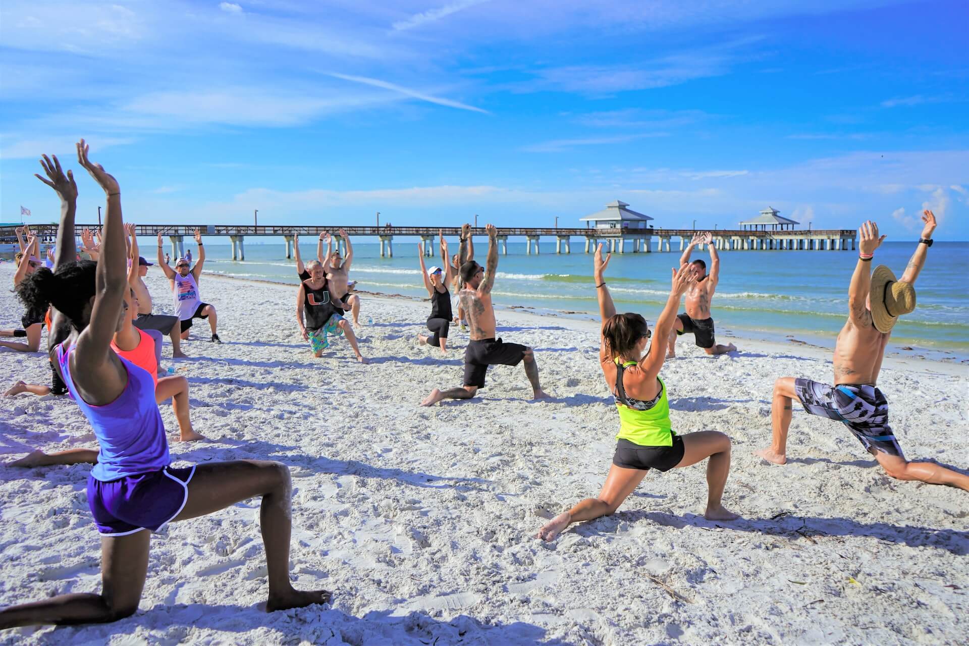 group-of-peope-exercising-on-the-beach