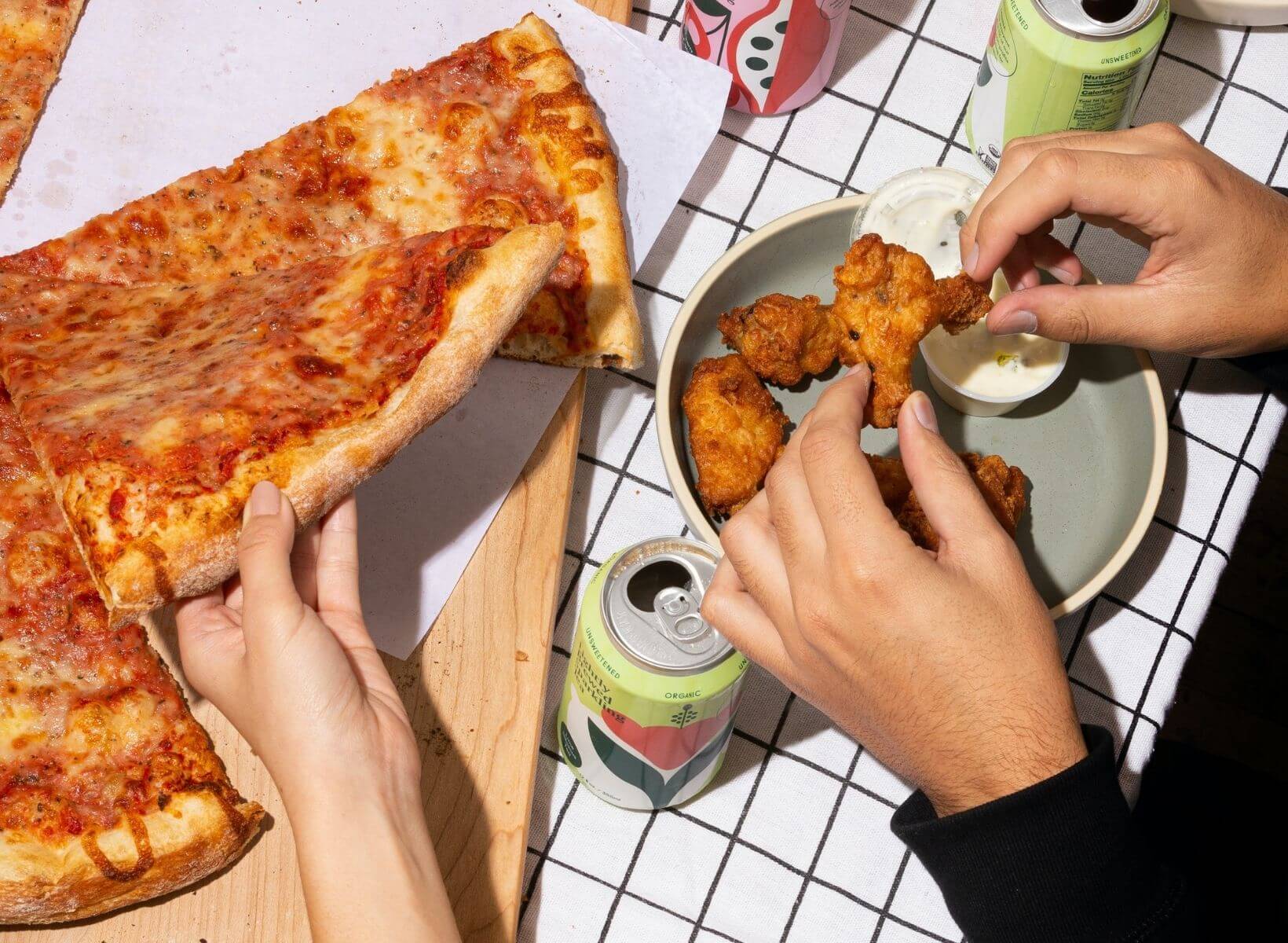 Overhead angle of people eating pizza