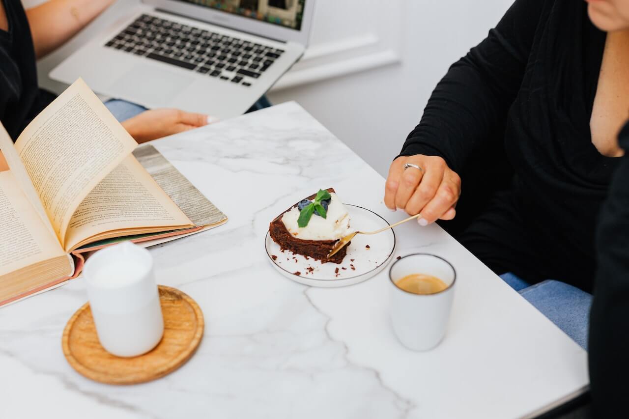 a woman eating keto brownies