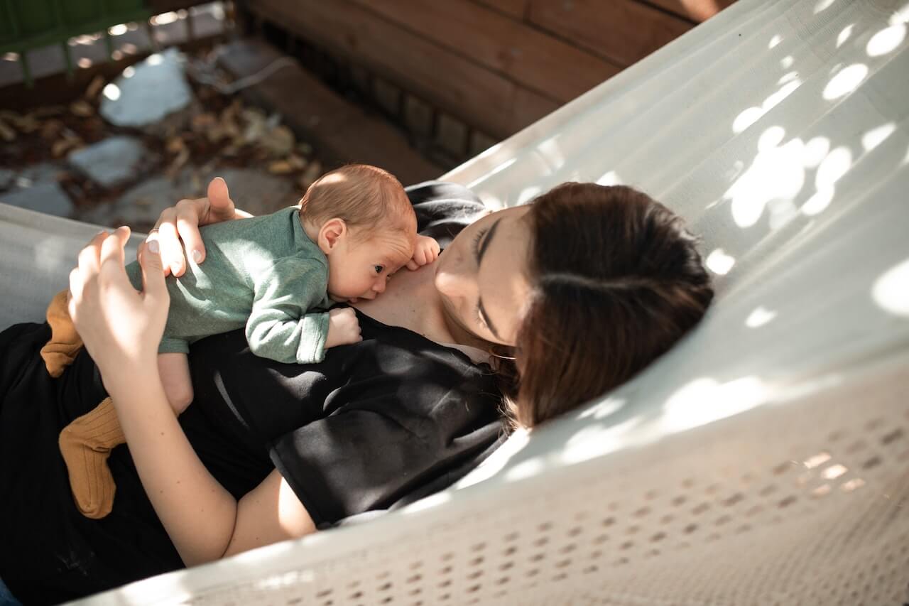 Mother-with-a-Baby-Lying-on-a-Hammock