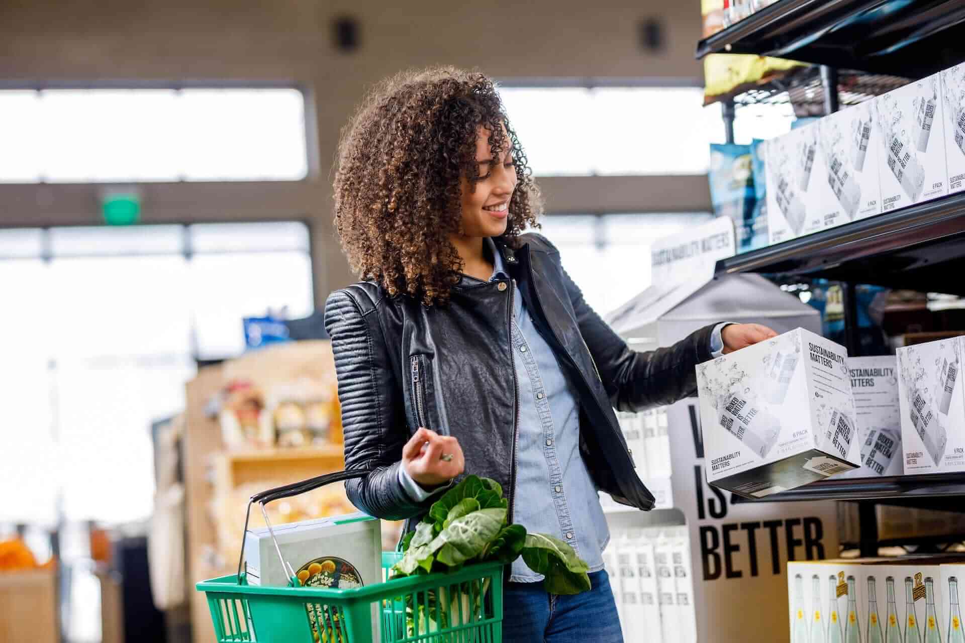 woman-carrying-grocery-basket-with-vegetables