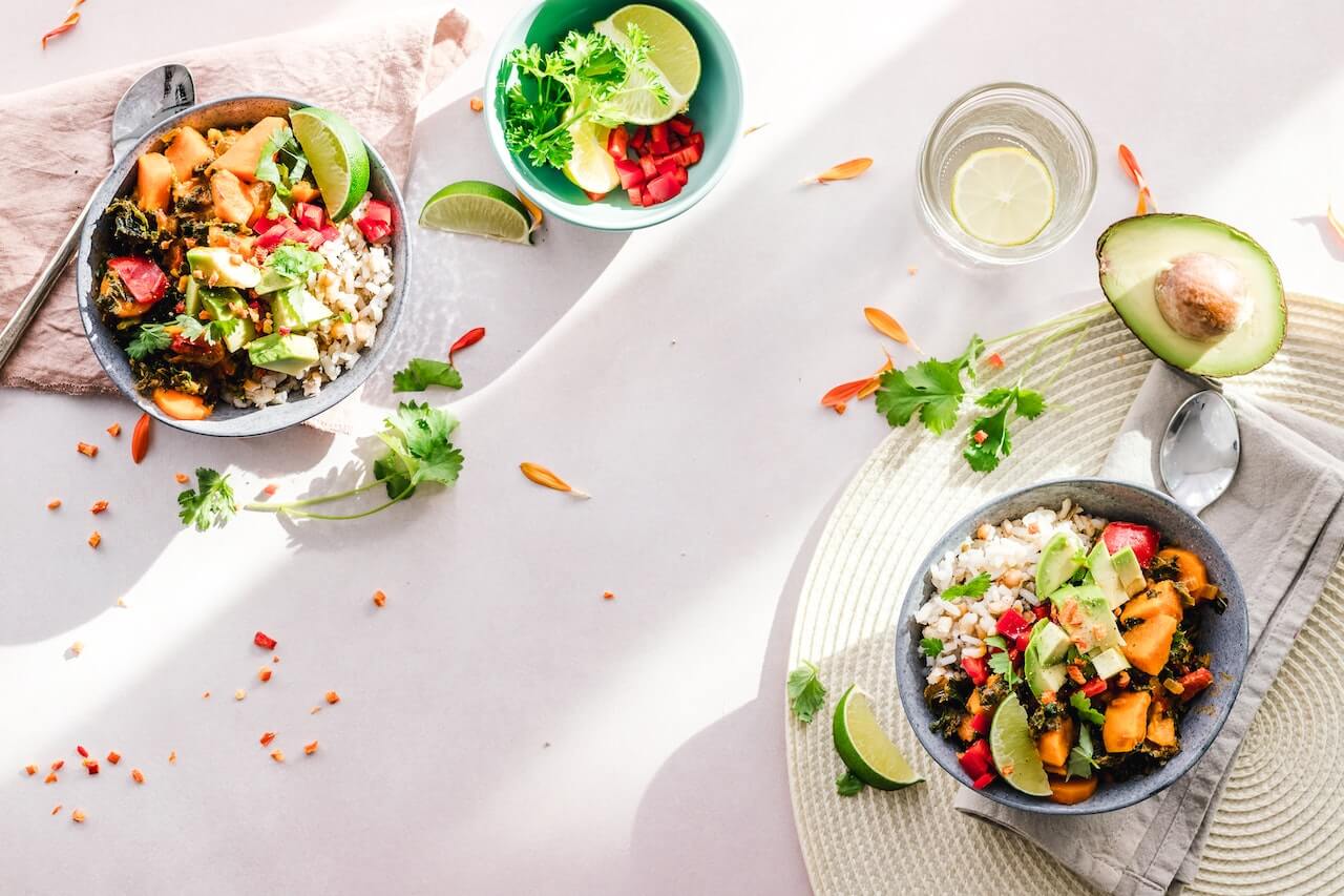 Two-bowls-with-mediterranean-salads-on-top-of-kitchen-table