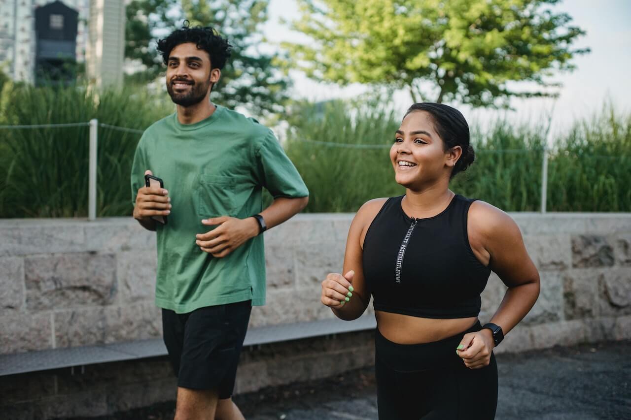 Man-and-woman-running-outdoors