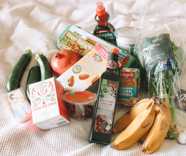 A grouping of "healthy" foods, including bananas, vegetables, and organic items