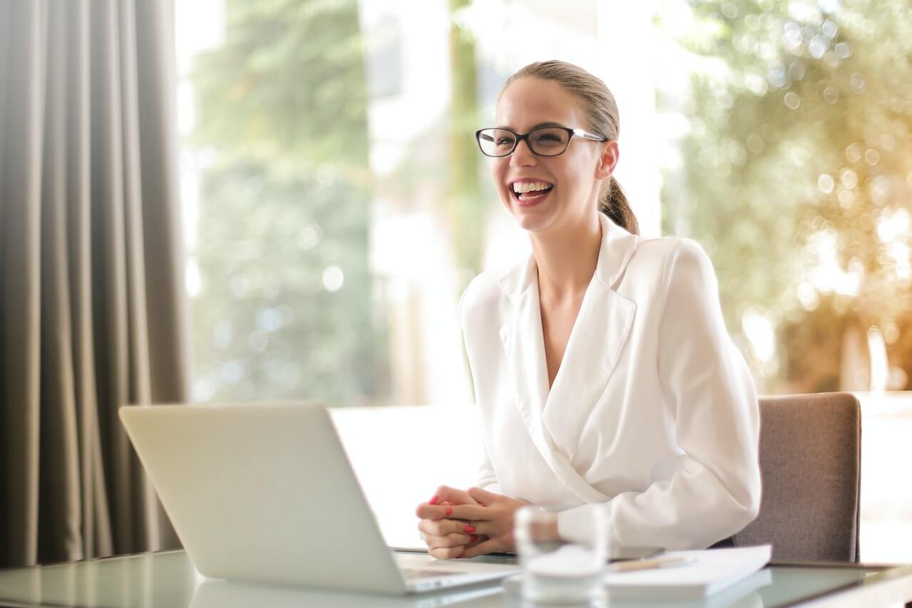 Happy woman working at office