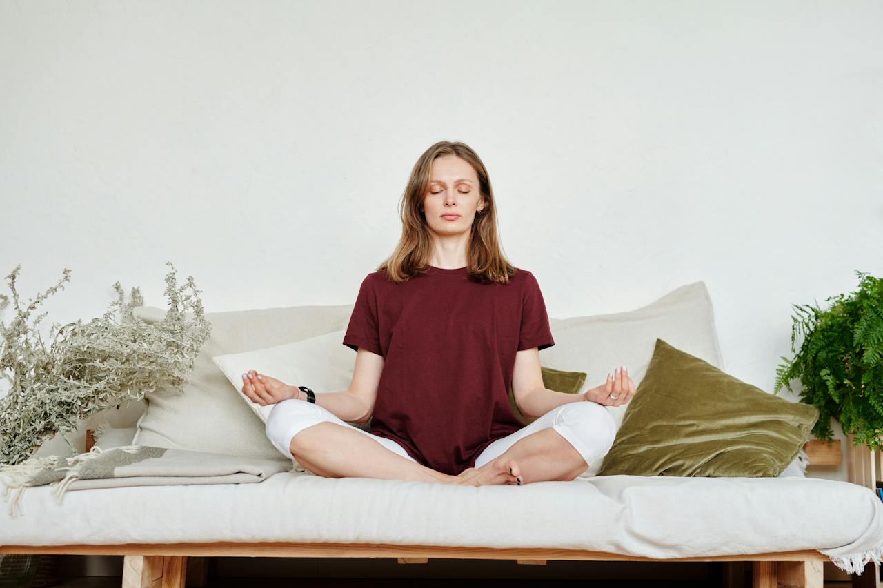 woman-meditating-over-yoga-matress