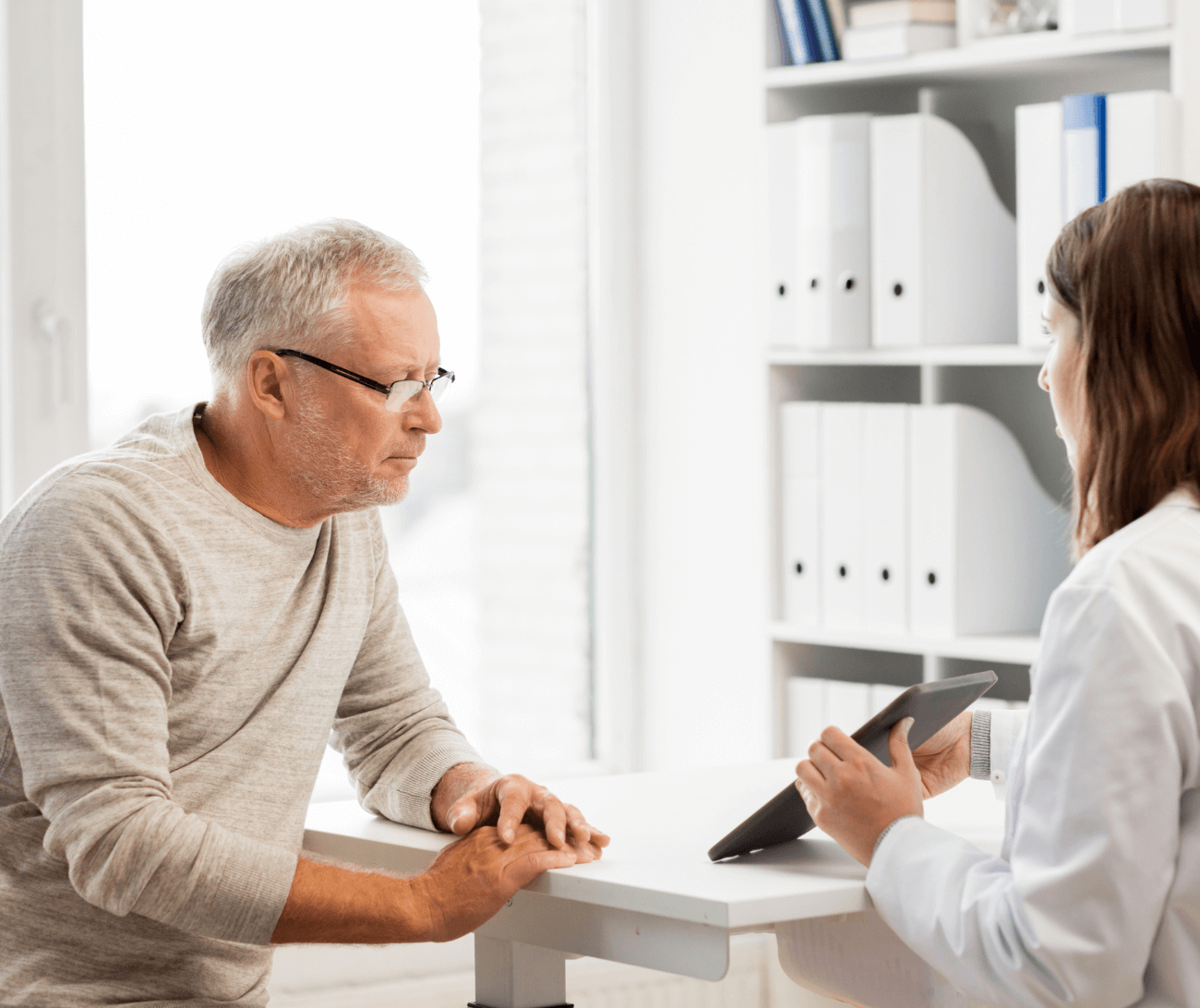 Aging man visiting medical provider